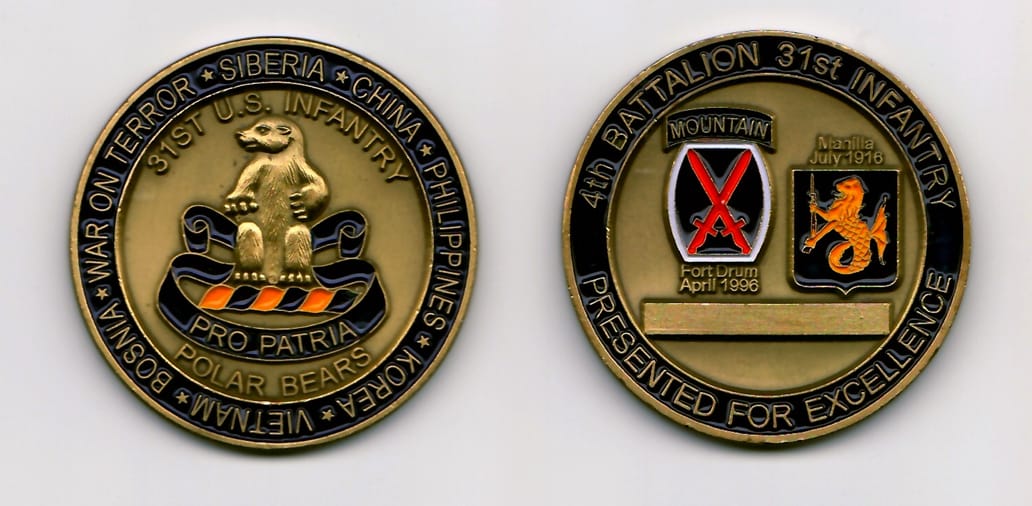 Round shaped, antique brass colored coin 2 inches in diameter.