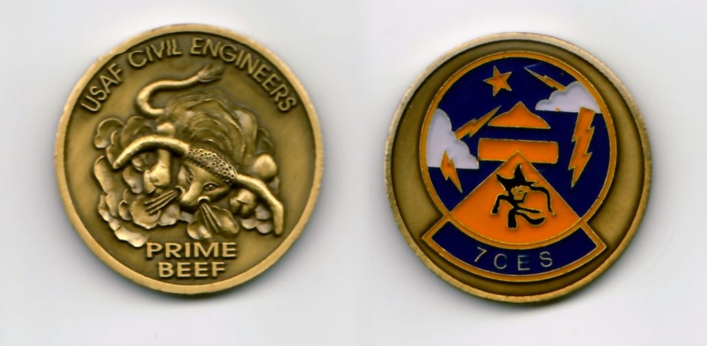 Round shaped, antique brass colored coin 1-1/2 inches in diameter.