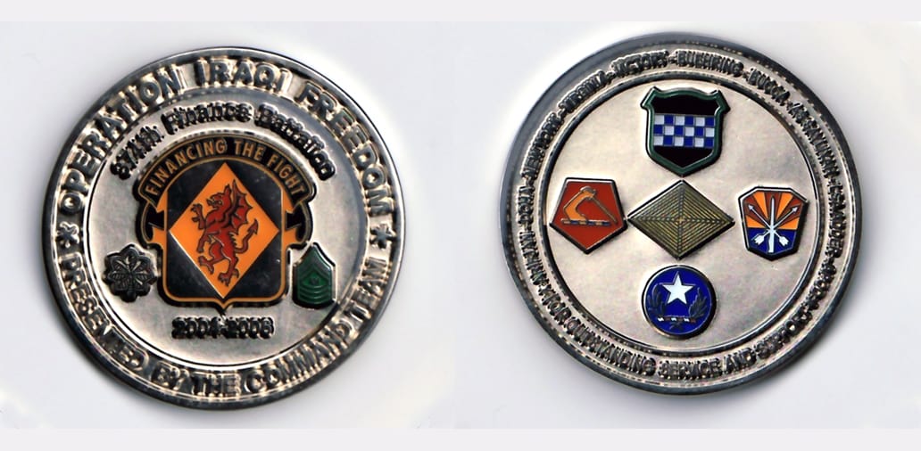 Round shaped, pewter colored coin, 2 inches in diameter with a smooth rim.