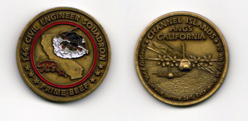 Round shaped, antique brass colored coin 1-1/2 inches in diameter.