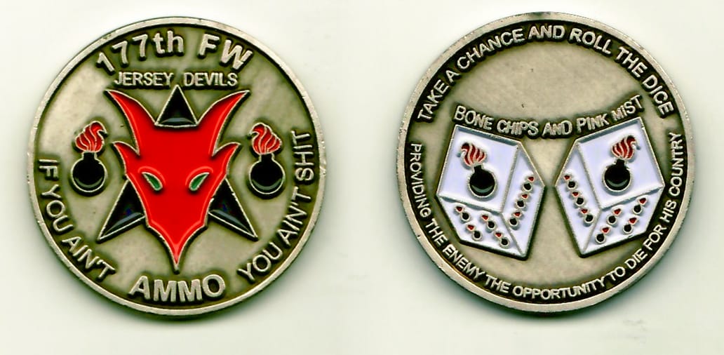 Round shaped, pewter colored coin, 1½ inches in diameter.