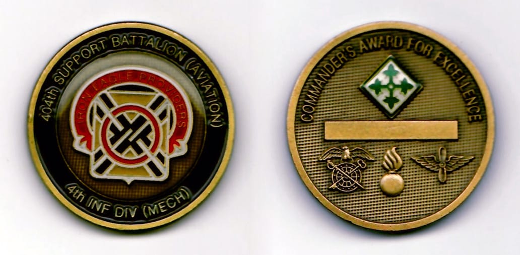 Round shaped, gold edged coin 1-9/16 inches in diameter.