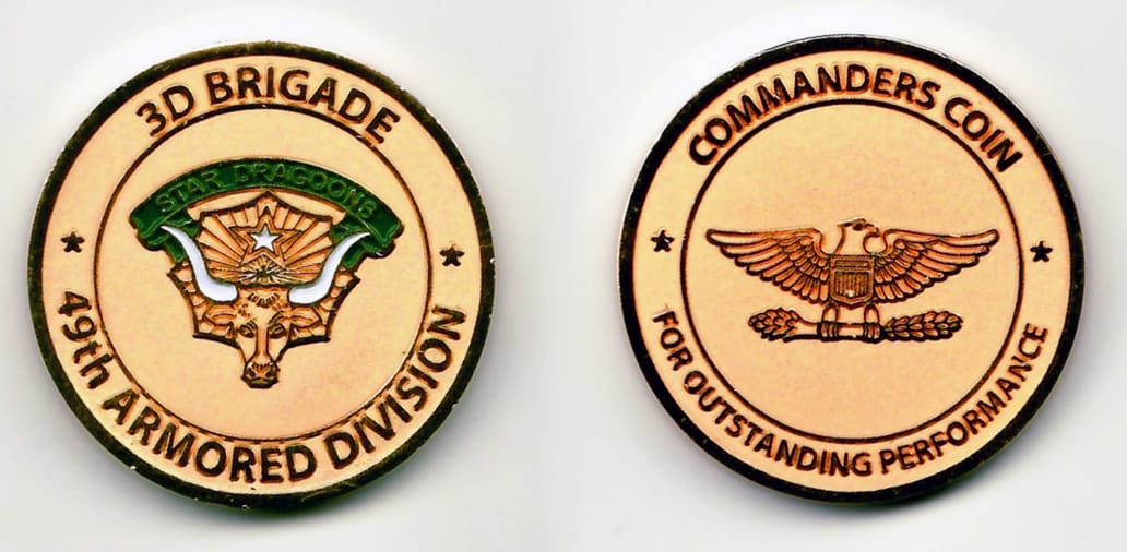 Round shaped, gold colored coin 1-1/2 inches in diameter.