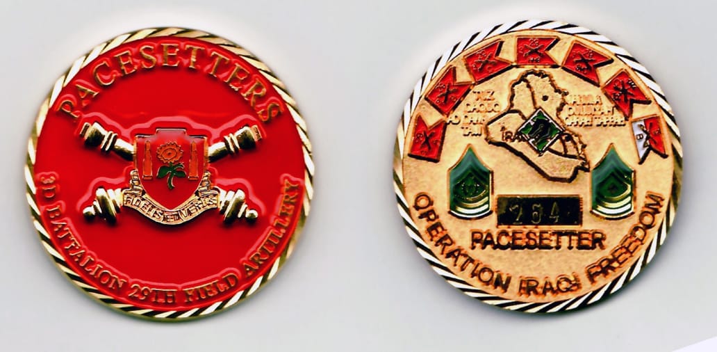 Round shaped, gold colored coin 2 inches in diameter.