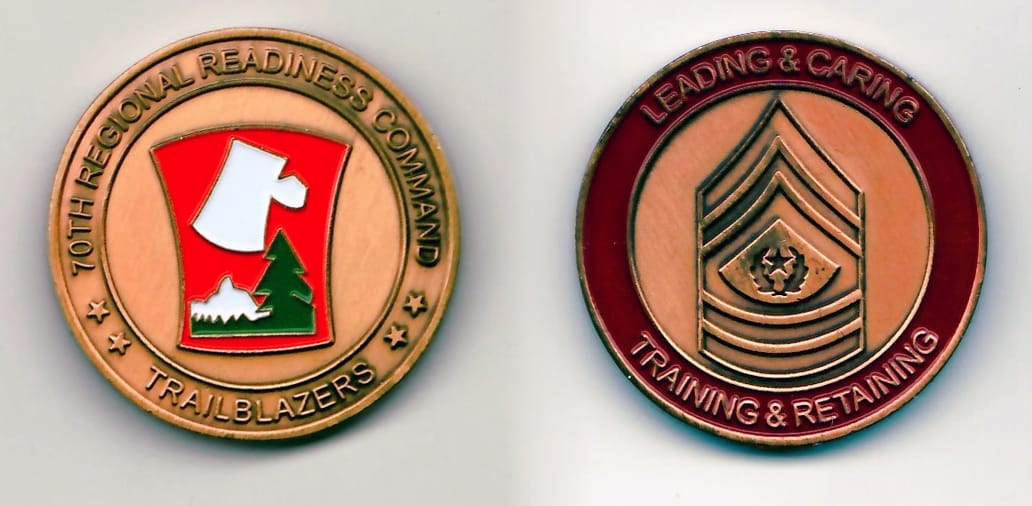 Round shaped, brass colored coin 1-1/2 inches in diameter.