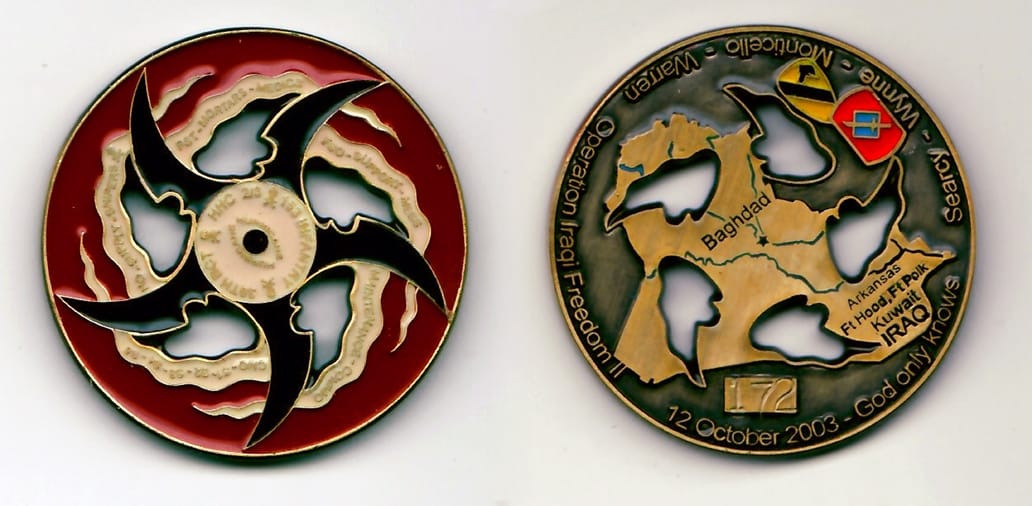 Round shaped, brass colored coin 1¾ inches in diameter with cut out areas.