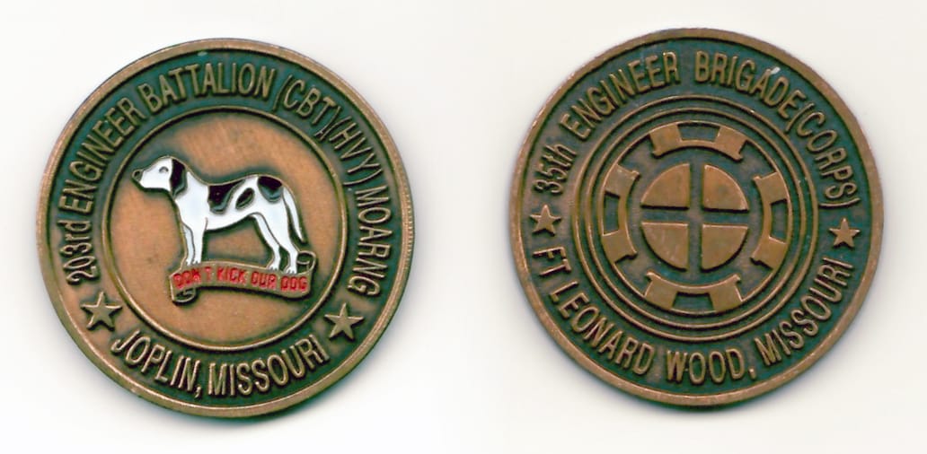 Round shaped, bronze colored coin 1-1/2 inches in diameter.