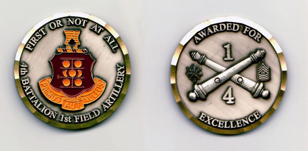 Round shaped, pewtered colored coin with gold colored rim,  1-13/16 inches in diameter.