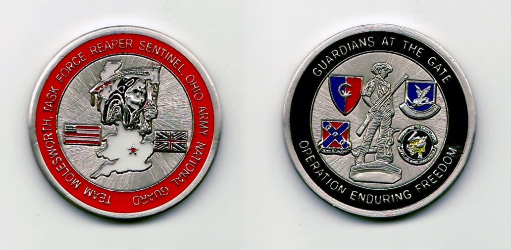 Round shaped, silver colored coin 1-5/8 inches in diameter.