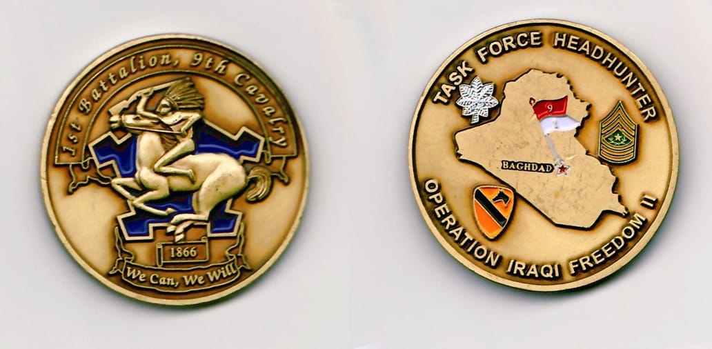 Round shaped, gold colored coin 1¾ inches in diameter.