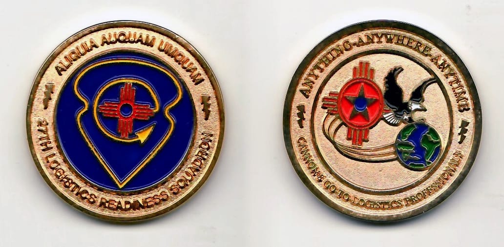 Round shaped, gold colored coin 1-1/2 inches in diameter.