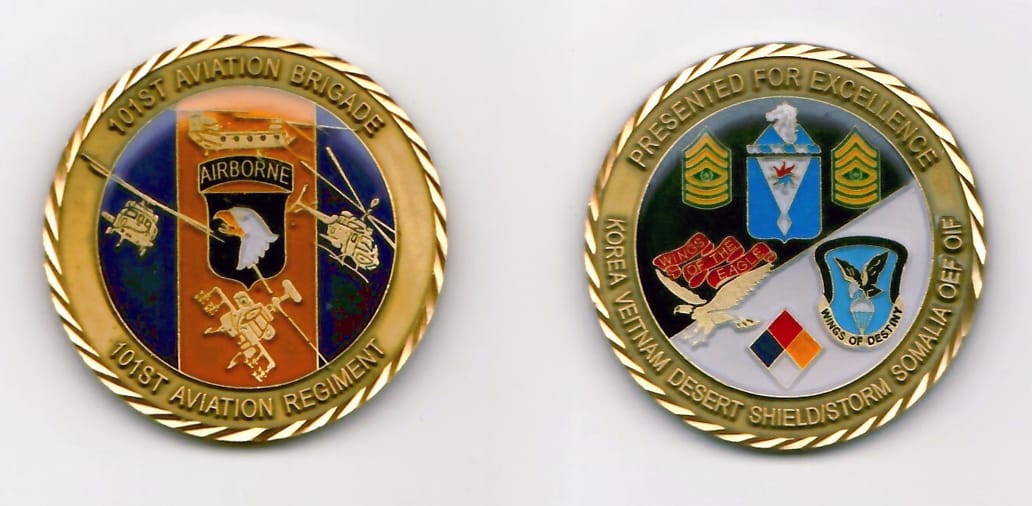 Round shaped, gold colored coin 1-1/6 inches in diameter.