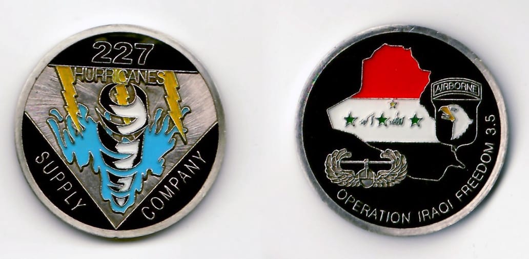 Round shaped, pewter colored coin 1-5/8 inches in diameter.