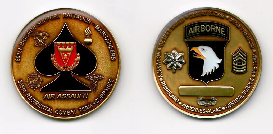 Round shaped, brass colored coin 1-5/8 inches in diameter.