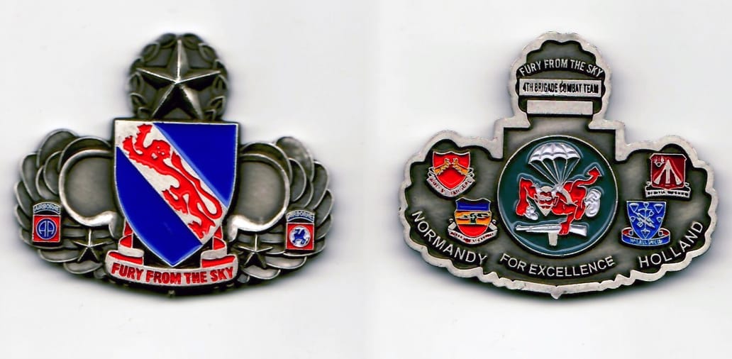 Master airborne wings shaped, pewter colored coin 2 inches wide x 2-5/8 inches high.