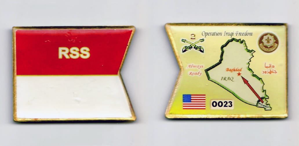 Swallowtail flag shaped, brass colored, enameled coin 2 inches wide x 1-1/2 inches high.