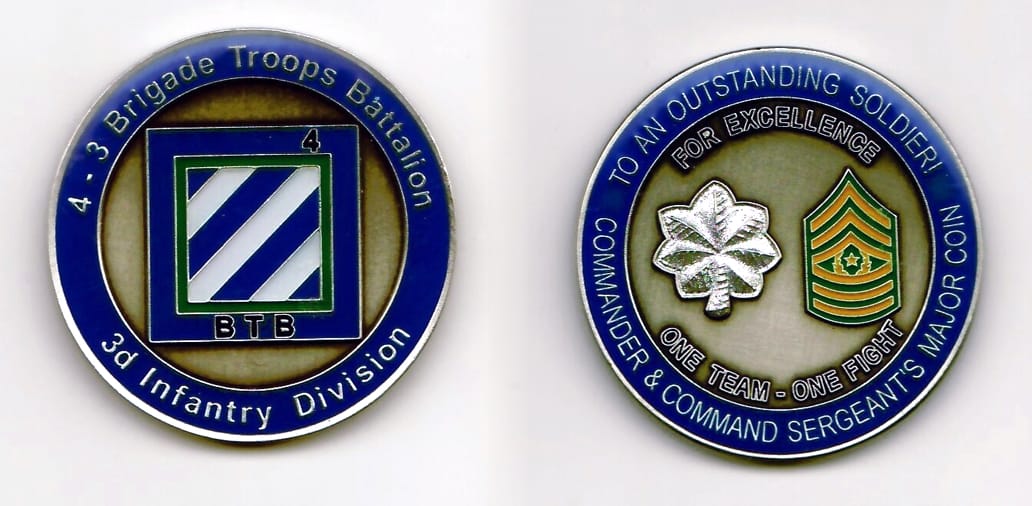 Round shaped, pewtered colored coin 1-3/4 inches in diameter.