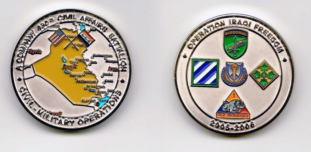 Round shaped, white gold colored coin 1-3/4 inches in diameter.