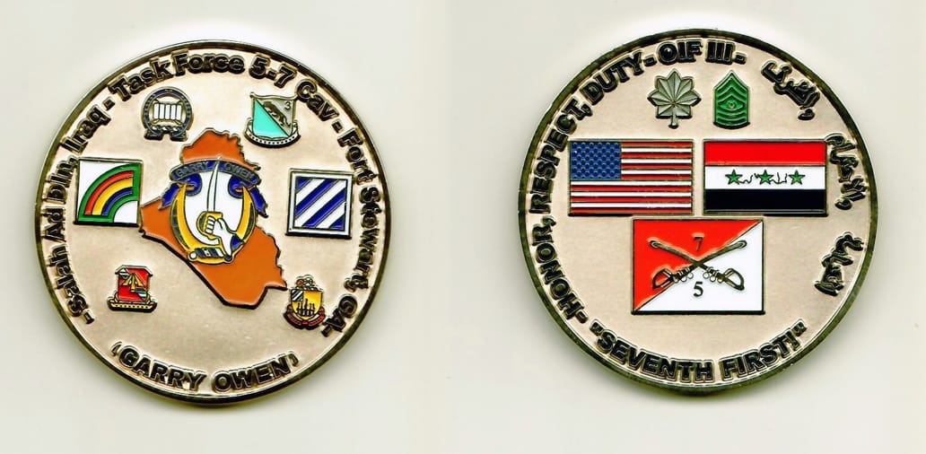 Round shaped, gold colored coin 2 inches in diameter.