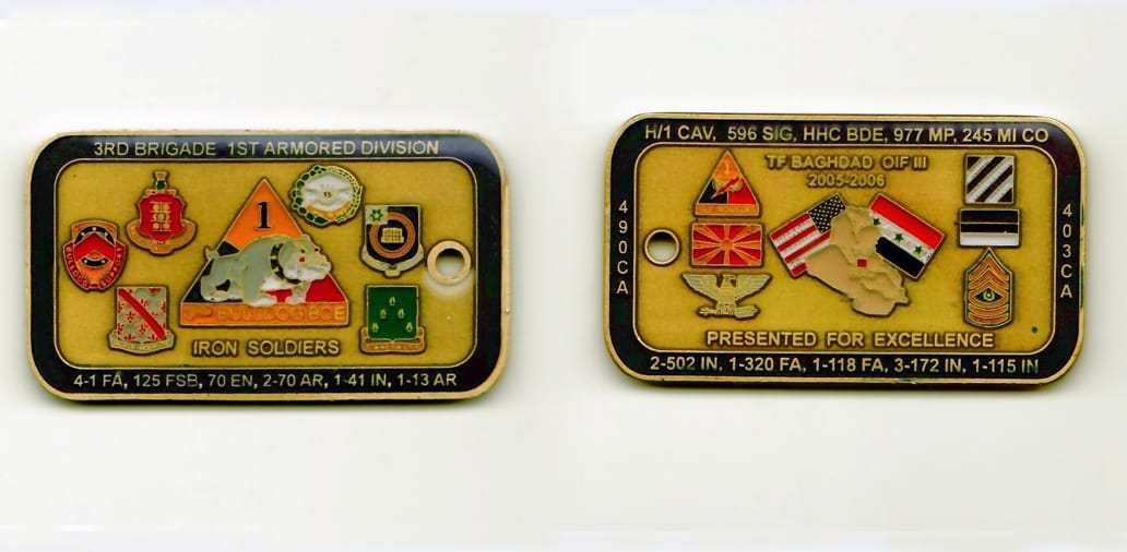 Rectangular shaped, brass colored coin with rounded corners, 2-1/2 inches wide x 1-3/8 inches high .