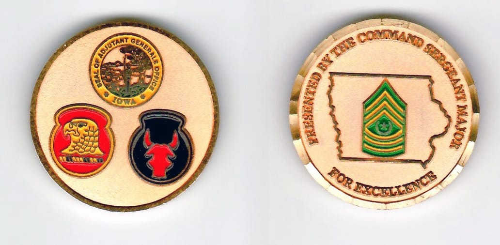 Round shaped, gold colored coin 1-1/2 inches in diameter.