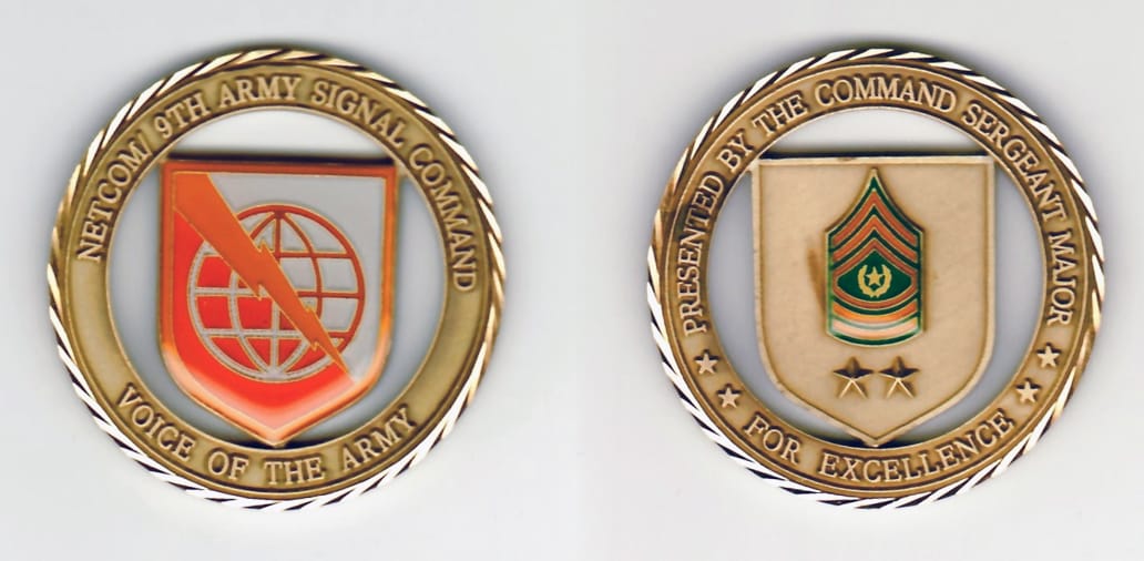 Round shaped, brass colored coin with gold colored rim,  1-15/16 inches in diameter.