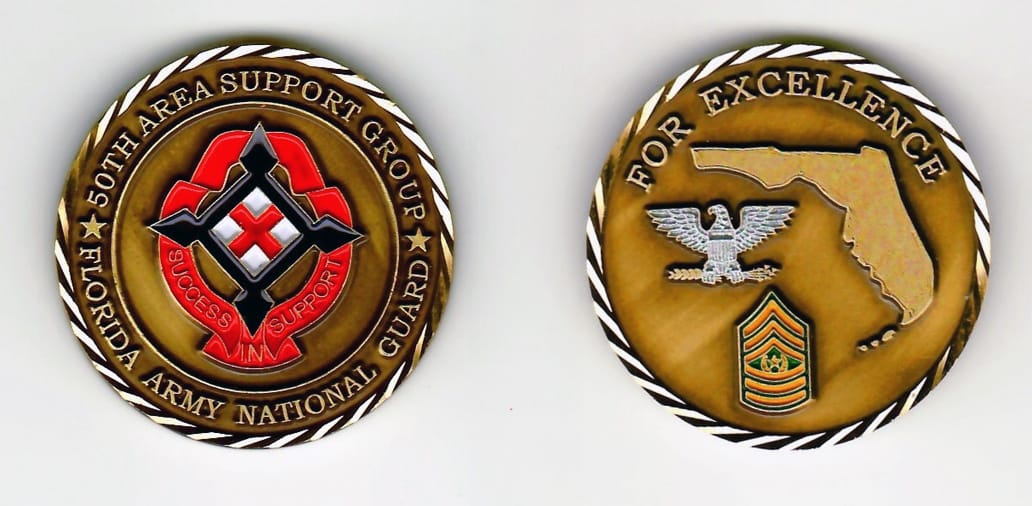 Round shaped, brass colored coin with a gold colored rim, 1-9/16 inches in diameter.