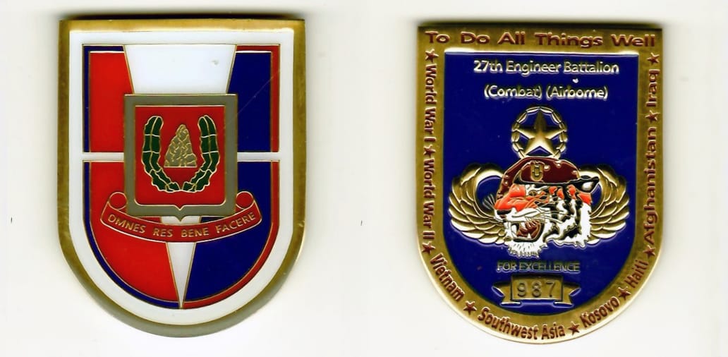 Shield with a rounded bottom shaped, gold colored coin 1-9/16 inches wide x 2 inches high.