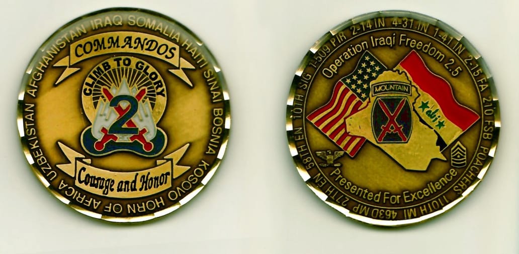 Round shaped, bronze colored coin 2 inches in diameter.