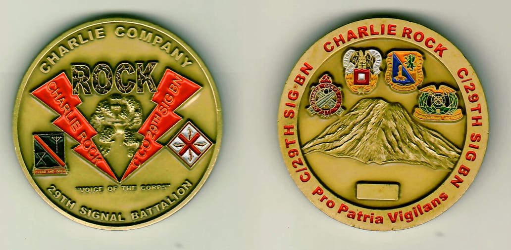 Round shaped, brass colored coin 1-3/4 inches in diameter.