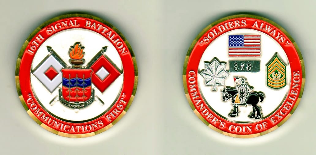 Round shaped, brass colored coin 1-15/16 inches in diameter.