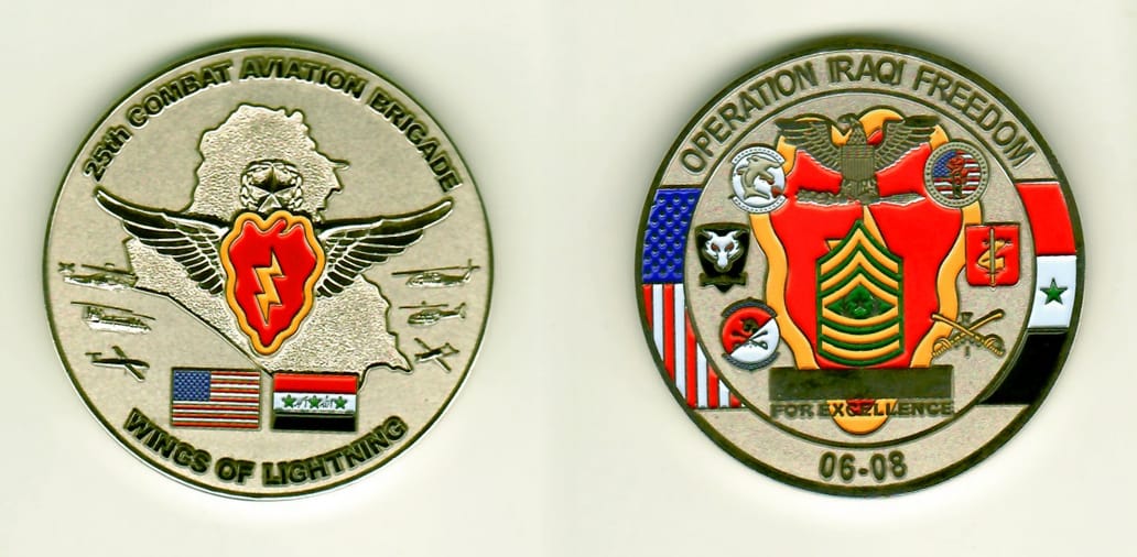 Round shaped, silver colored coin 2 inches in diameter.