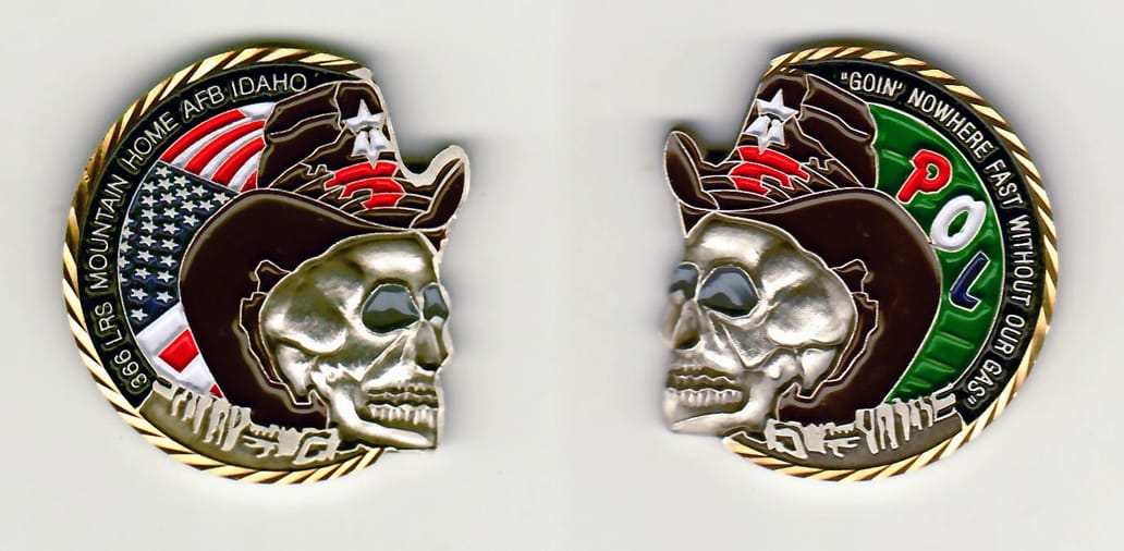 Three quarter moon shaped, pewter colored coin with profile of skull face protuding from the flat side of the coin,  1-5...