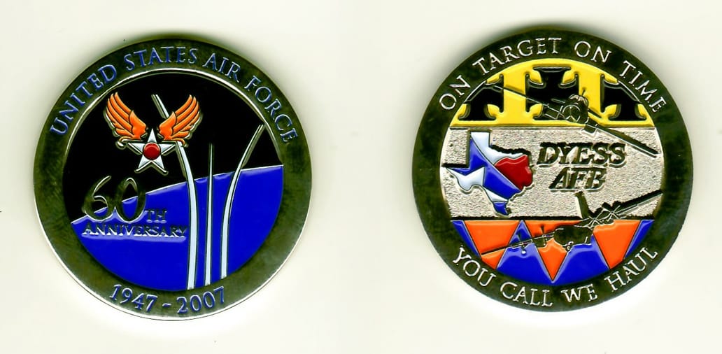 Round shaped, silver colored coin 1-3/4 inches in diameter.