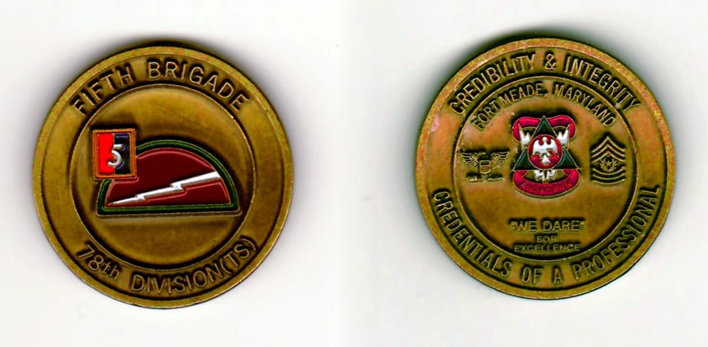 Round shaped, antique brass colored coin 1-1/2 inches in diameter.