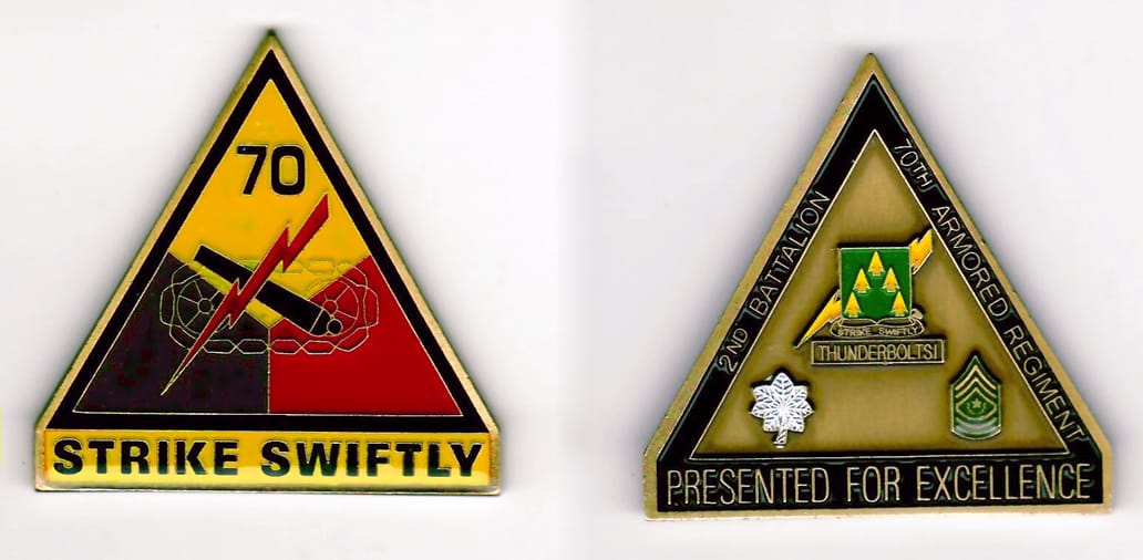 Triangular shaped, antique brass colored coin 2-1/8 inches wide x 2-1/16 inches high.