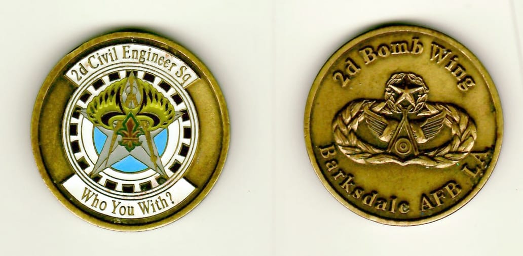 Round shaped, brass colored coin 1-1/2 inches in diameter.