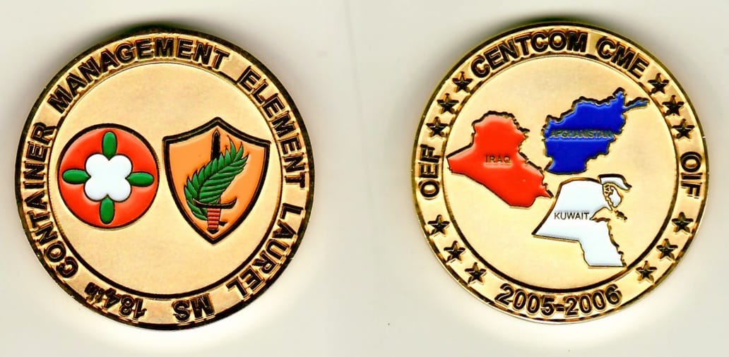 Round shaped, gold colored coin 1-3/4 inches in diameter.