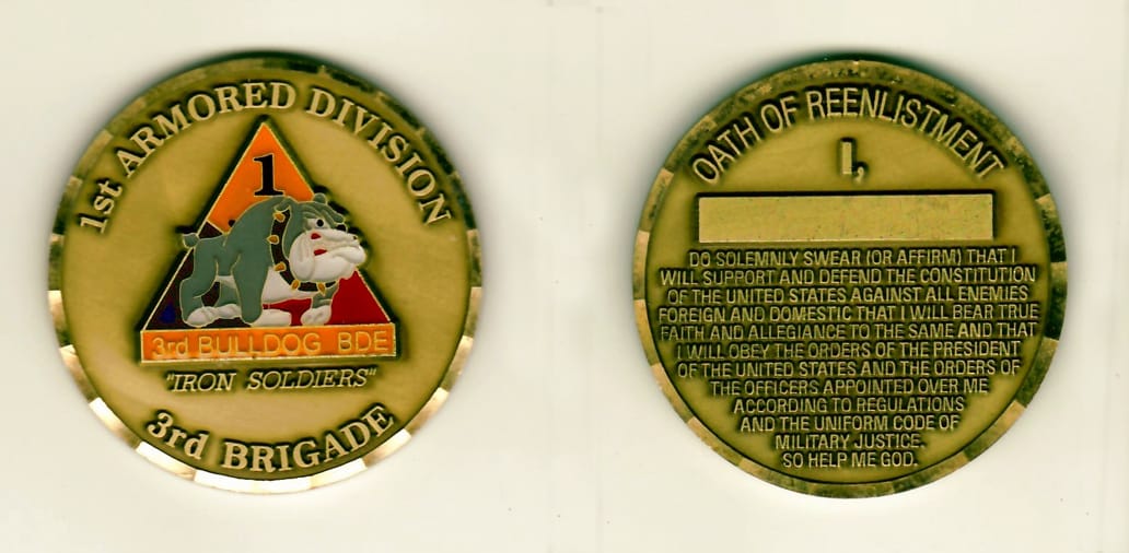 Round shaped, brass colored coin 1-15/16 inches in diameter.