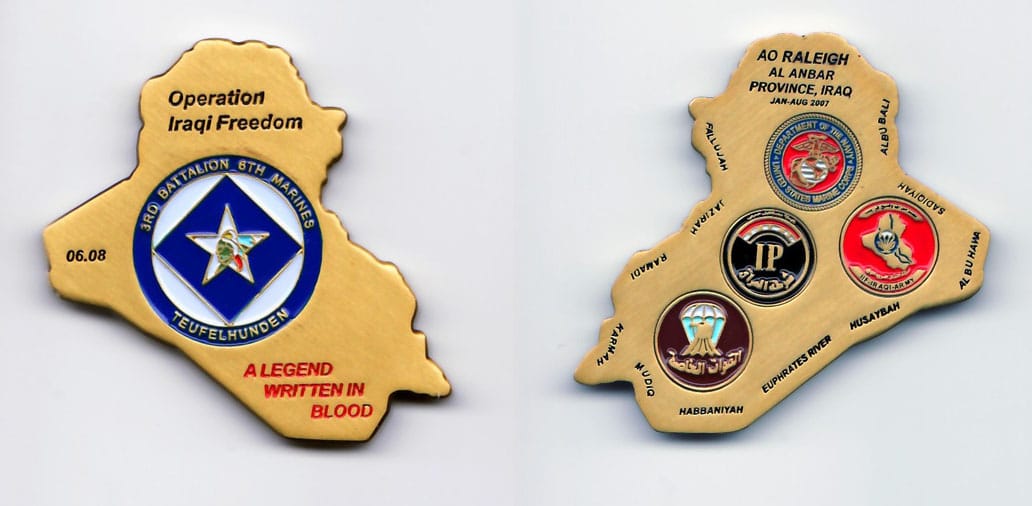 Iraq shaped, gold colored coin, 2-1/2 inches wide x 2-15/16 inches high.