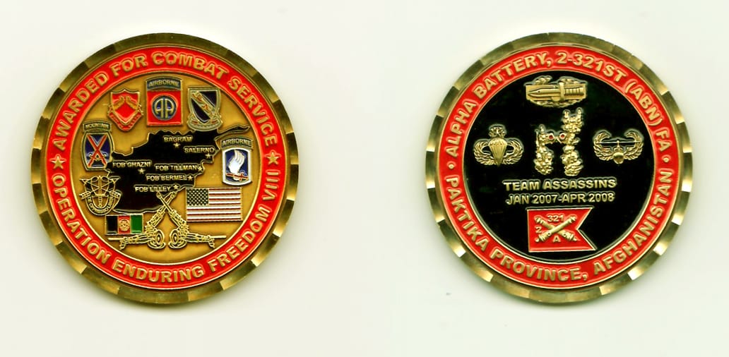 Round shaped, gold colored coin with gold colored rim, 1-15/16 inches in diameter.