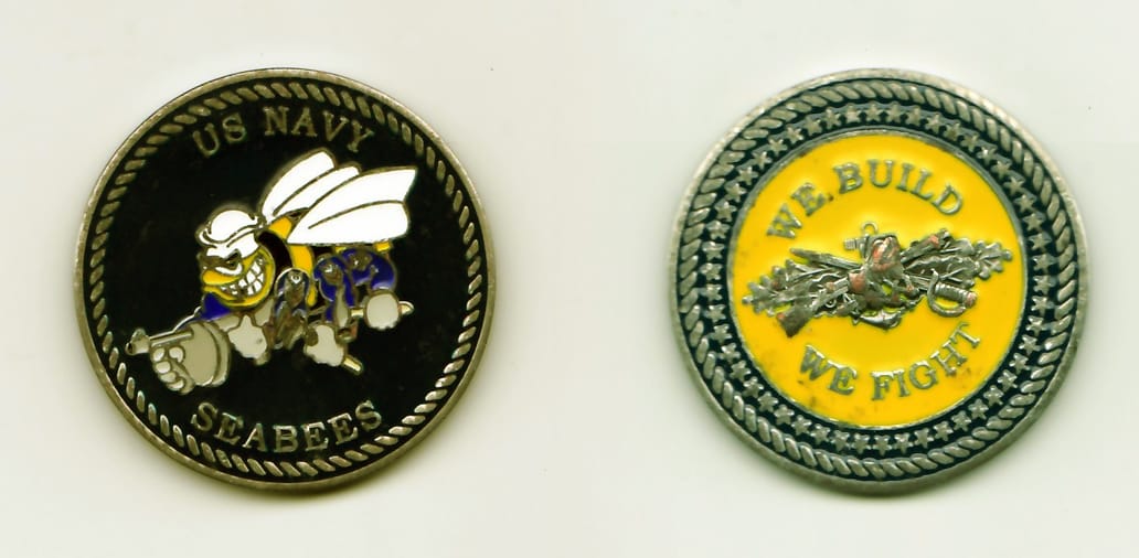 Round shaped, silver colored coin, 1-3/4 inches in diameter.