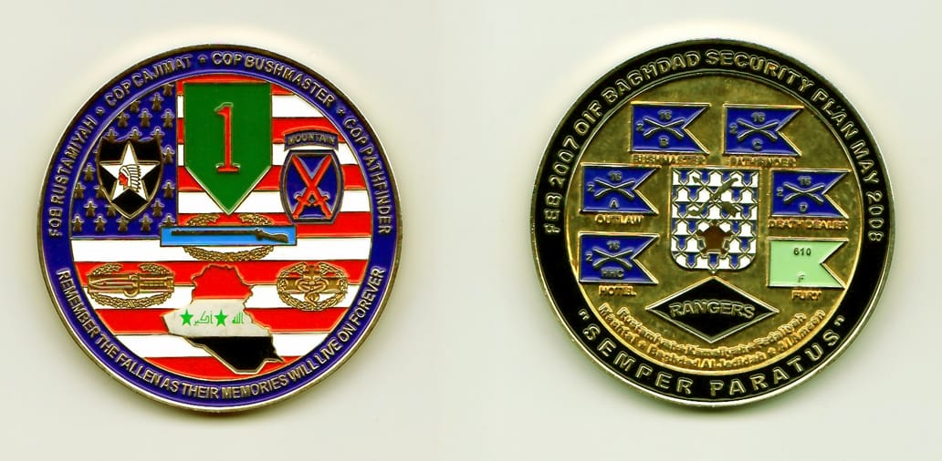 Round shaped, gold colored coin, 1-15/16 inches in diameter.