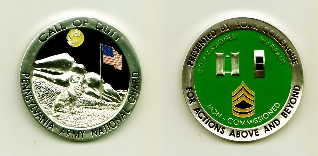 Round shaped, chrome colored coin, 1-3/4 inches in diameter.