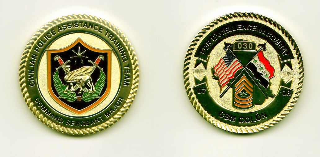 Round shaped, gold colored coin, 1-3/4 inches in diameter.