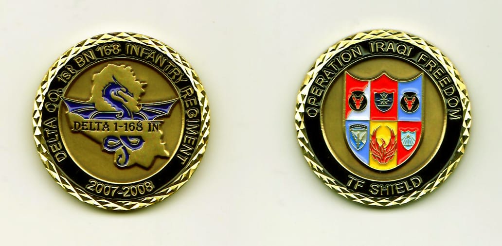 Round shaped, bronze colored coin, with gold rim, 1-1/2 inches in diameter.