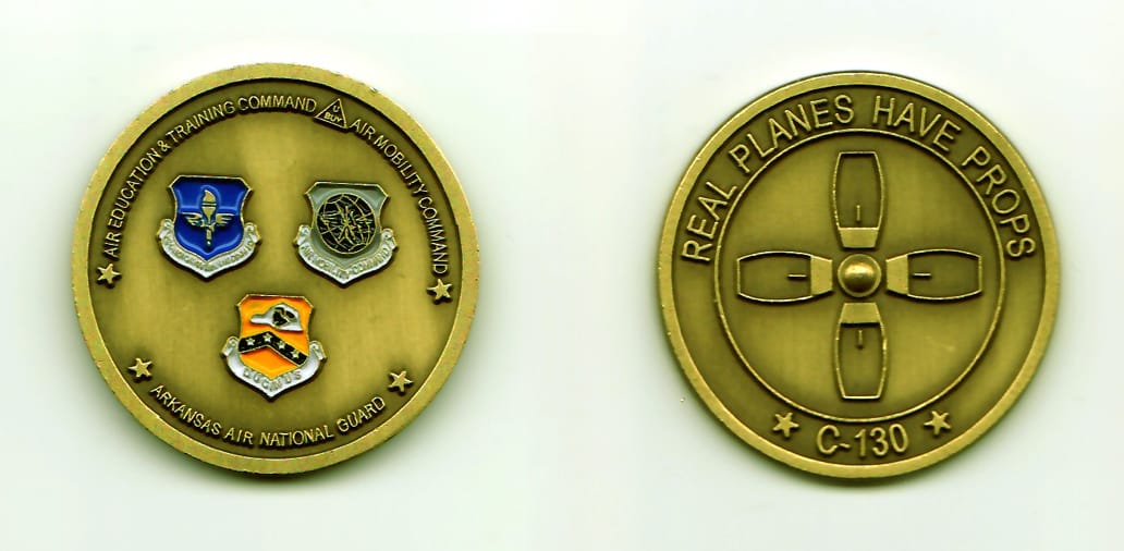 Round shaped, bronze colored coin, 1-5/8 inches in diameter.