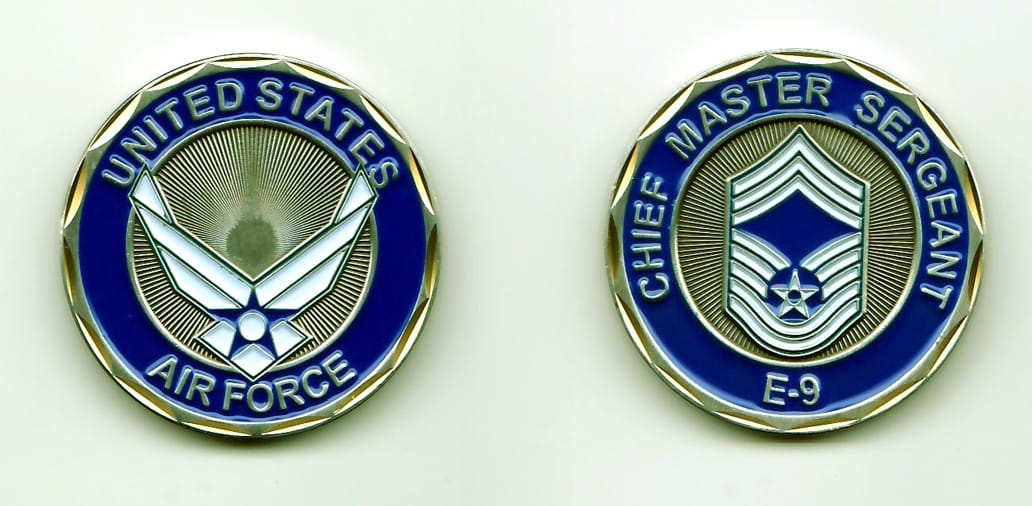 Round shaped, silver colored coin, 1-5/8 inches in diameter.