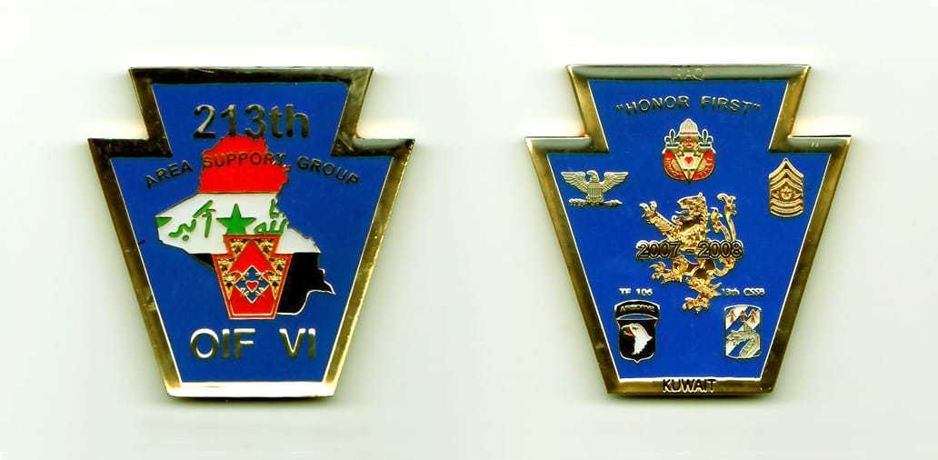 Keystone shaped, gold colored coin, 2 inches wide x 2 inches high.