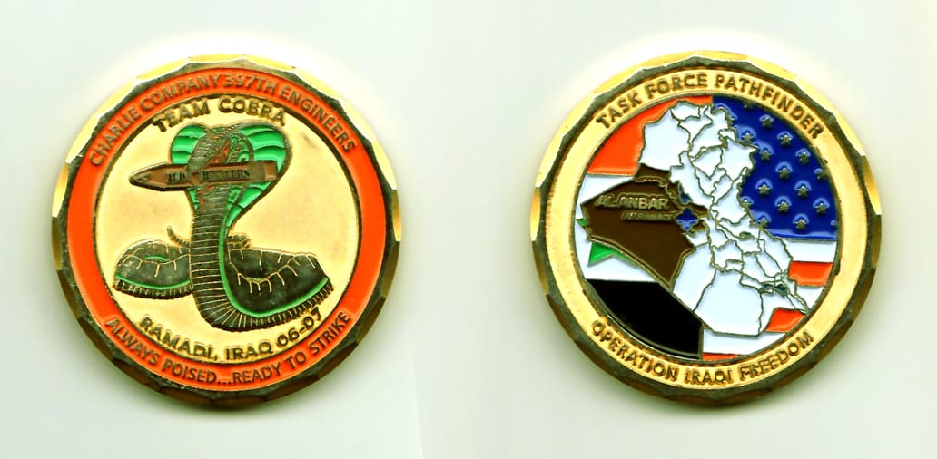 Round shaped, gold colored coin, 1-3/4 inches in diameter.